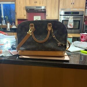 Authentic Louis Vuitton Alma - Vintage